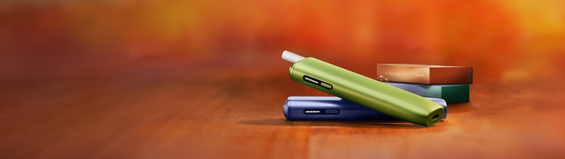 جهاز IQOS ILUMA i ONE الأخضر الورقي  فوق جهاز IQOS ILUMA i ONE اللافندر